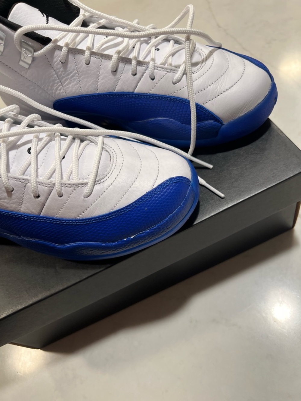 Jordan White and Royal Blue Retro 12 Sneakers - Picture 6 of 13